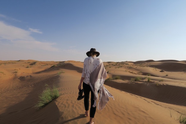 Oman Wahiba desert woman