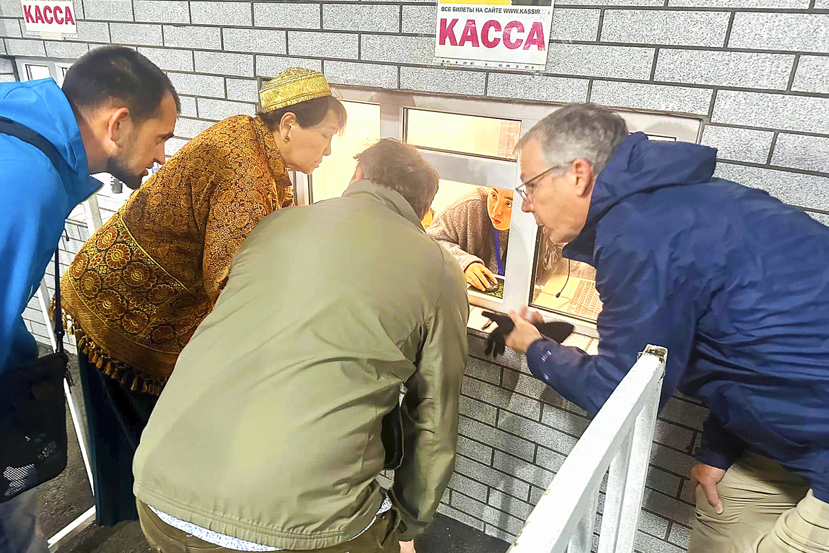 Buying Tickets. Photo by Brendan Powell.