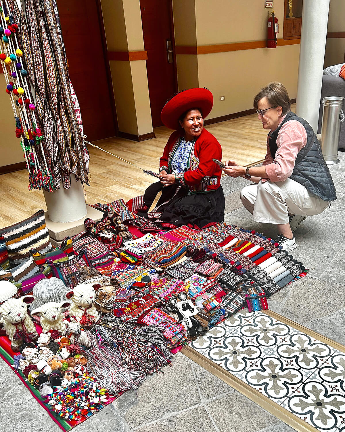Joanna Sharing Photos with the Hotel Craftswoman