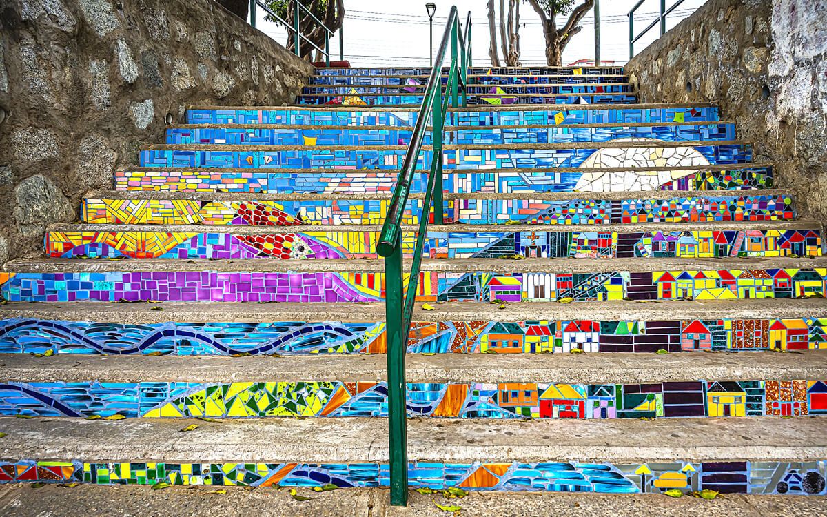 Street Art in the Cerro Concepción neighborhood: Colorful stair mosaic on the risers, merging into a full image at Plaza de Los Poetas