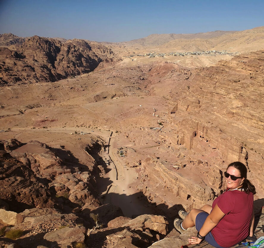Tea time at the High Place of Sacrifice. Bedouins that used to live in the tombs of Petra have been relocated to the small town visible on the top of the hill to the right