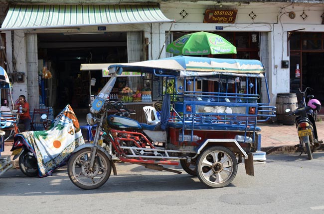 The iconic vehicle on the streets of Laos a.k.a. Tuk-tuk | Location: Luang Prabang,  Lao People's Democratic Republic