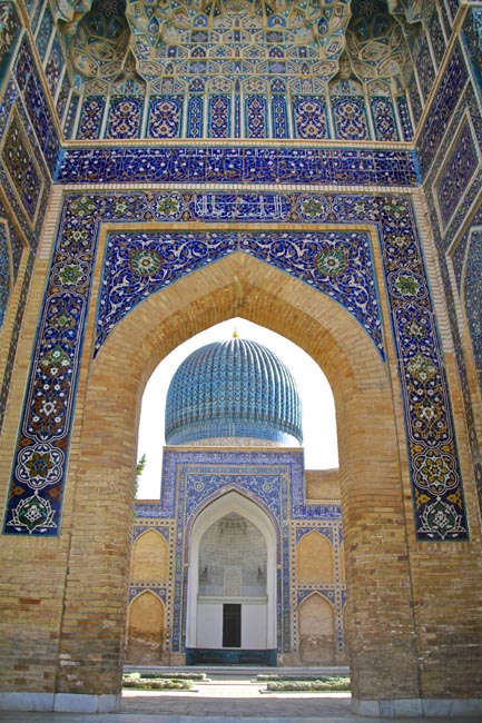 Among the Unesco sites is the Registan Mosque and madrasas which features this decorated Pointed Arch | Location: Samarkand,  Uzbekistan